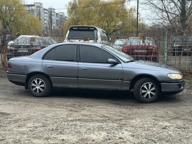 Серый Опель Омега, объемом двигателя 2 л и пробегом 295 тыс. км за 2200 $, фото 2 на Automoto.ua