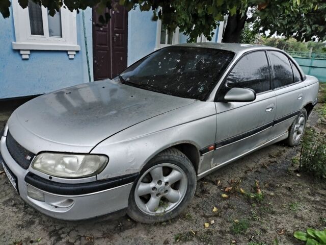 Серый Опель Омега, объемом двигателя 2 л и пробегом 370 тыс. км за 1200 $, фото 2 на Automoto.ua