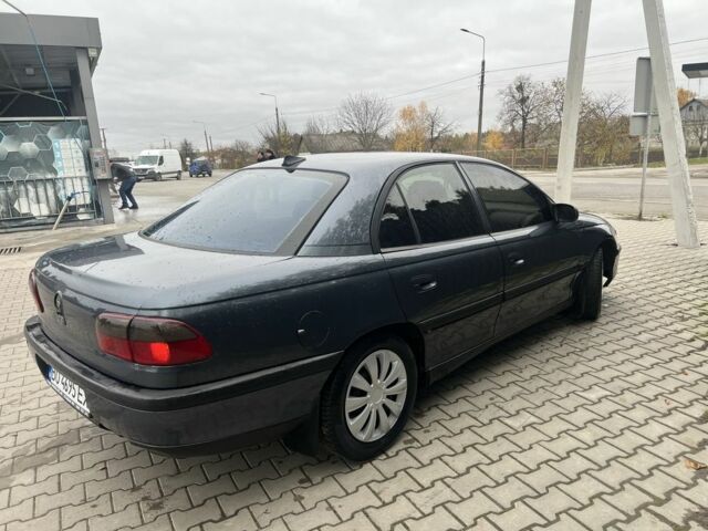 Серый Опель Омега, объемом двигателя 2 л и пробегом 280 тыс. км за 2400 $, фото 3 на Automoto.ua