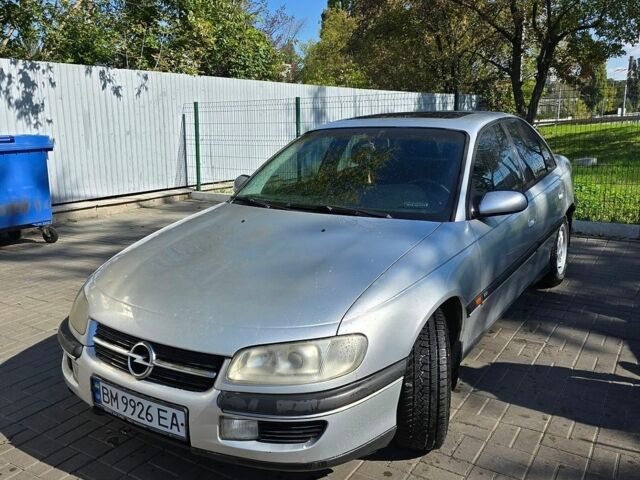 Сірий Опель Омега, об'ємом двигуна 2 л та пробігом 209 тис. км за 4000 $, фото 1 на Automoto.ua