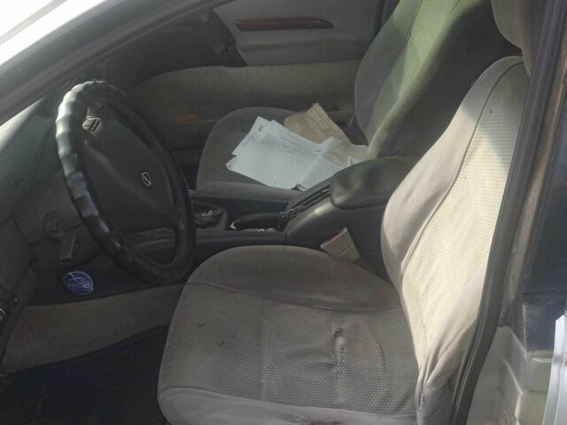 Серый Опель Омега, объемом двигателя 2 л и пробегом 400 тыс. км за 596 $, фото 5 на Automoto.ua