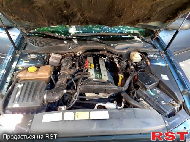 Серый Опель Омега, объемом двигателя 2 л и пробегом 325 тыс. км за 2200 $, фото 2 на Automoto.ua