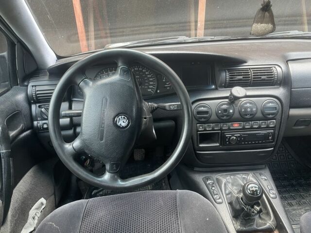 Сірий Опель Омега, об'ємом двигуна 2 л та пробігом 248 тис. км за 1500 $, фото 6 на Automoto.ua