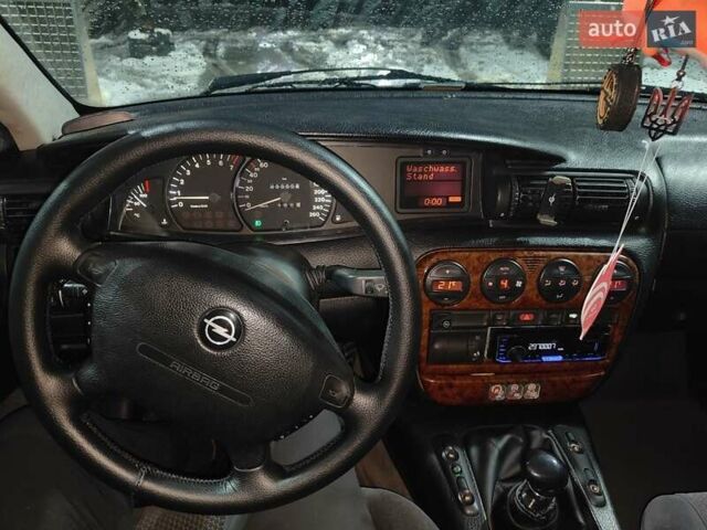 Серый Опель Омега, объемом двигателя 2.5 л и пробегом 410 тыс. км за 1600 $, фото 3 на Automoto.ua