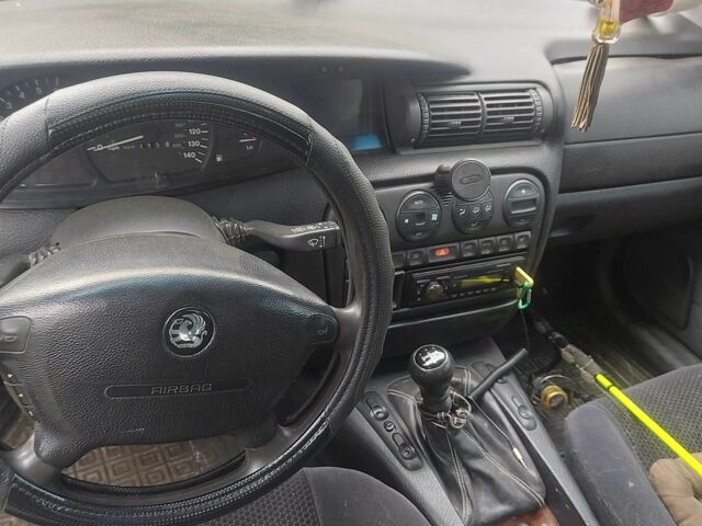 Сірий Опель Омега, об'ємом двигуна 2 л та пробігом 243 тис. км за 1200 $, фото 6 на Automoto.ua