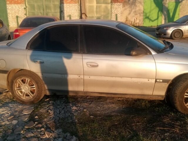 Сірий Опель Омега, об'ємом двигуна 2 л та пробігом 300 тис. км за 950 $, фото 3 на Automoto.ua