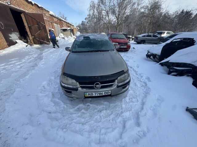 Сірий Опель Омега, об'ємом двигуна 2 л та пробігом 300 тис. км за 1300 $, фото 2 на Automoto.ua