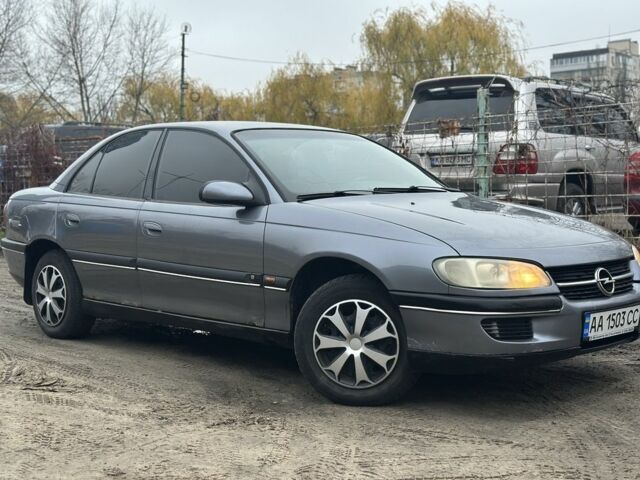 Серый Опель Омега, объемом двигателя 2 л и пробегом 295 тыс. км за 2200 $, фото 1 на Automoto.ua