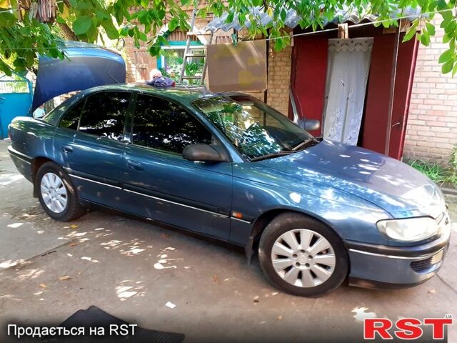 Сірий Опель Омега, об'ємом двигуна 2 л та пробігом 327 тис. км за 2400 $, фото 1 на Automoto.ua