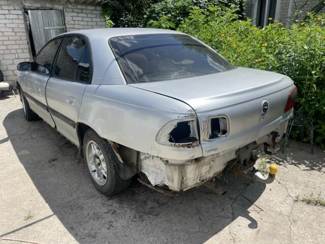Сірий Опель Омега, об'ємом двигуна 2.5 л та пробігом 300 тис. км за 850 $, фото 2 на Automoto.ua