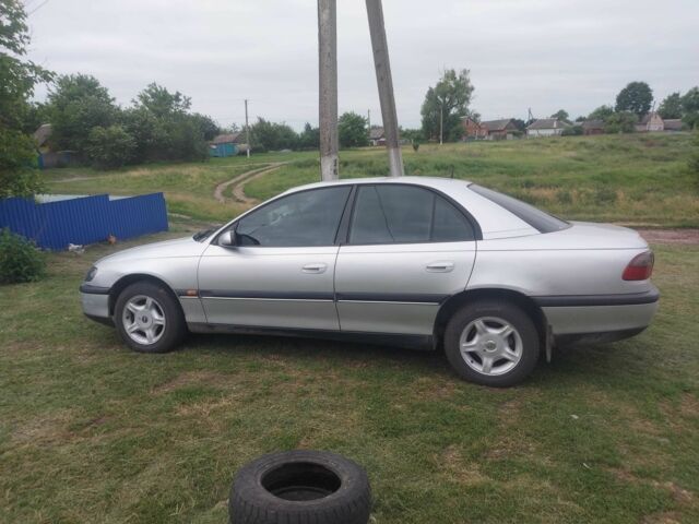 Сірий Опель Омега, об'ємом двигуна 2 л та пробігом 243 тис. км за 2500 $, фото 5 на Automoto.ua