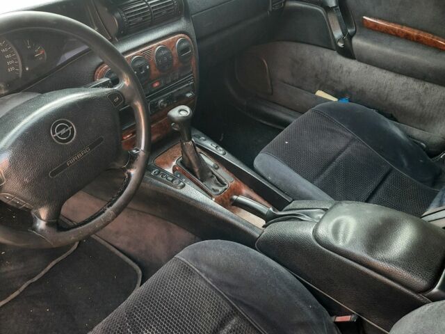 Серый Опель Омега, объемом двигателя 2 л и пробегом 390 тыс. км за 2999 $, фото 3 на Automoto.ua