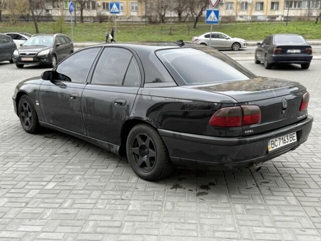 Сірий Опель Омега, об'ємом двигуна 2.5 л та пробігом 400 тис. км за 999 $, фото 2 на Automoto.ua