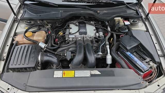 Серый Опель Омега, объемом двигателя 2.5 л и пробегом 380 тыс. км за 2700 $, фото 12 на Automoto.ua