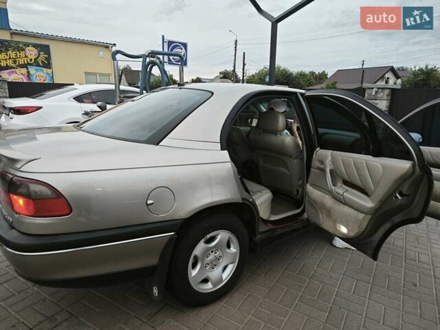 Серый Опель Омега, объемом двигателя 2.5 л и пробегом 380 тыс. км за 2700 $, фото 33 на Automoto.ua