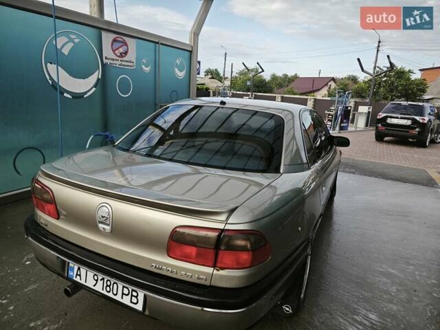 Серый Опель Омега, объемом двигателя 2.5 л и пробегом 380 тыс. км за 2700 $, фото 24 на Automoto.ua