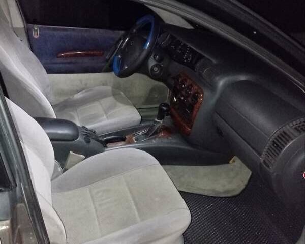 Сірий Опель Омега, об'ємом двигуна 2 л та пробігом 370 тис. км за 2300 $, фото 6 на Automoto.ua
