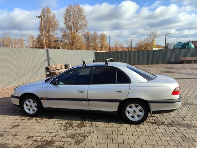 Серый Опель Омега, объемом двигателя 2 л и пробегом 100 тыс. км за 2300 $, фото 1 на Automoto.ua