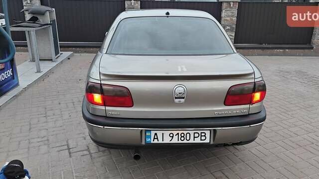 Серый Опель Омега, объемом двигателя 2.5 л и пробегом 380 тыс. км за 2700 $, фото 4 на Automoto.ua