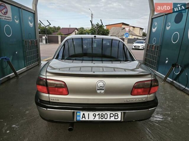 Серый Опель Омега, объемом двигателя 2.5 л и пробегом 380 тыс. км за 2700 $, фото 23 на Automoto.ua