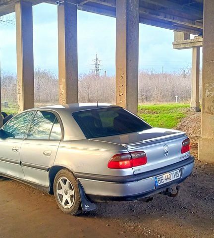 Серый Опель Омега, объемом двигателя 2.5 л и пробегом 290 тыс. км за 2000 $, фото 1 на Automoto.ua