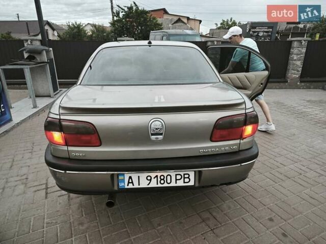 Серый Опель Омега, объемом двигателя 2.5 л и пробегом 380 тыс. км за 2700 $, фото 32 на Automoto.ua