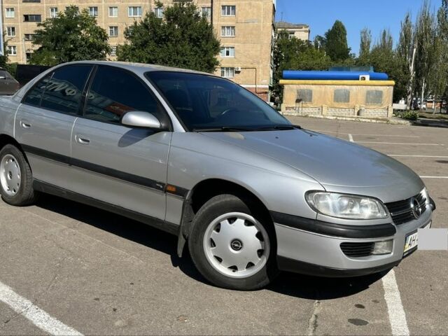Сірий Опель Омега, об'ємом двигуна 2 л та пробігом 205 тис. км за 2150 $, фото 1 на Automoto.ua
