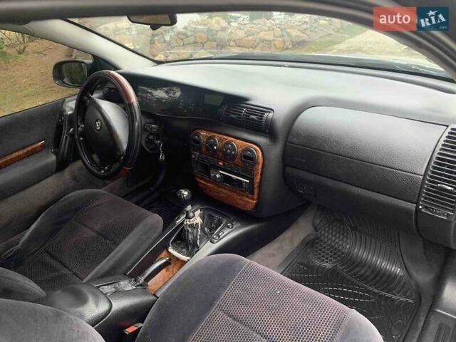 Сірий Опель Омега, об'ємом двигуна 2 л та пробігом 341 тис. км за 2300 $, фото 3 на Automoto.ua