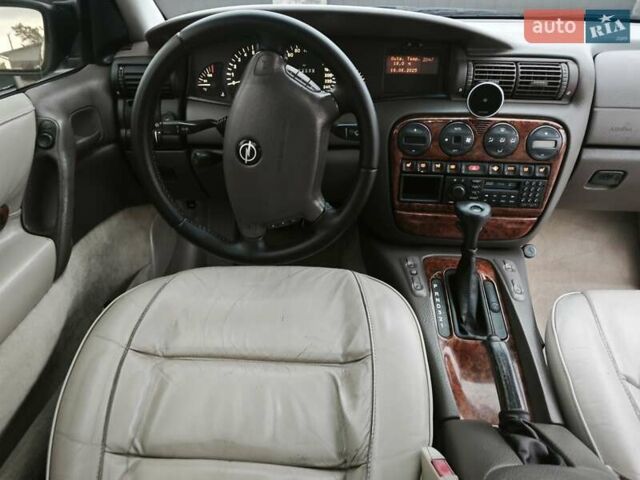 Серый Опель Омега, объемом двигателя 2.5 л и пробегом 380 тыс. км за 2700 $, фото 46 на Automoto.ua