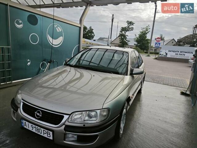 Серый Опель Омега, объемом двигателя 2.5 л и пробегом 380 тыс. км за 2700 $, фото 28 на Automoto.ua