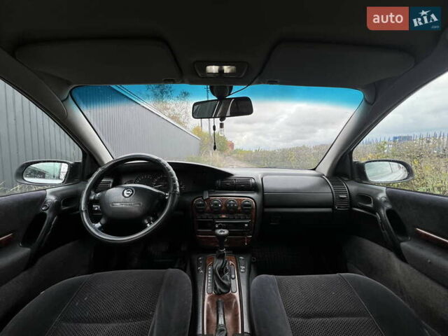 Сірий Опель Омега, об'ємом двигуна 2.5 л та пробігом 340 тис. км за 2399 $, фото 12 на Automoto.ua