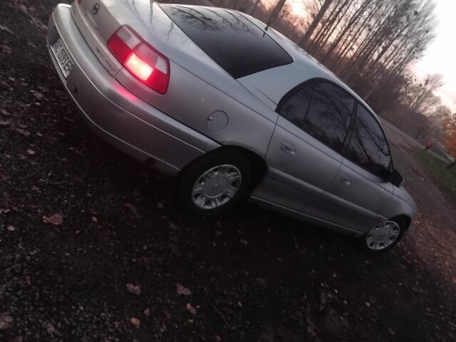 Серый Опель Омега, объемом двигателя 2 л и пробегом 375 тыс. км за 1750 $, фото 4 на Automoto.ua