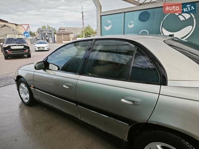 Серый Опель Омега, объемом двигателя 2.5 л и пробегом 380 тыс. км за 2700 $, фото 22 на Automoto.ua