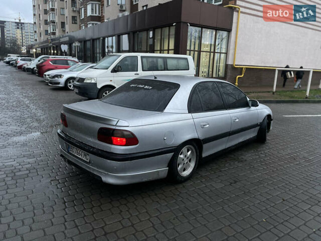 Серый Опель Омега, объемом двигателя 2.5 л и пробегом 204 тыс. км за 2600 $, фото 1 на Automoto.ua