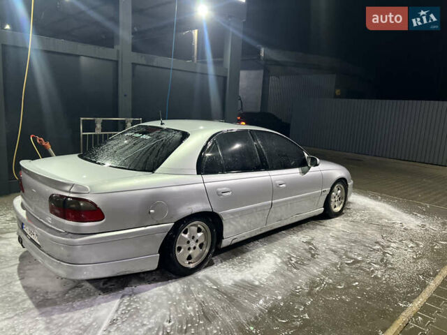 Серый Опель Омега, объемом двигателя 2.5 л и пробегом 250 тыс. км за 1550 $, фото 4 на Automoto.ua