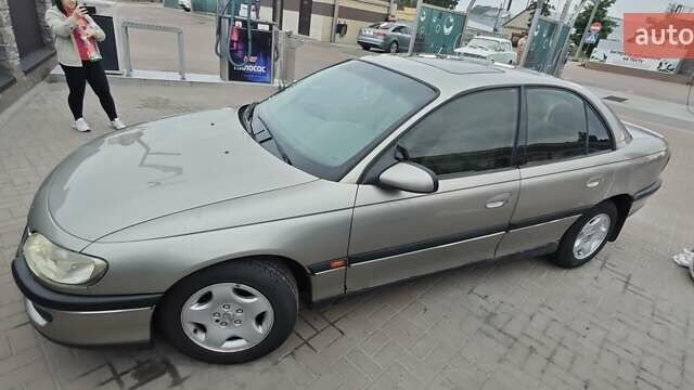 Серый Опель Омега, объемом двигателя 2.5 л и пробегом 380 тыс. км за 2700 $, фото 2 на Automoto.ua