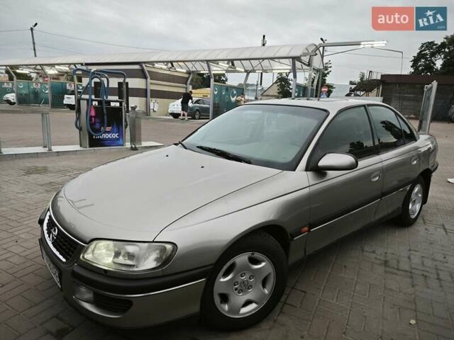 Серый Опель Омега, объемом двигателя 2.5 л и пробегом 380 тыс. км за 2700 $, фото 29 на Automoto.ua