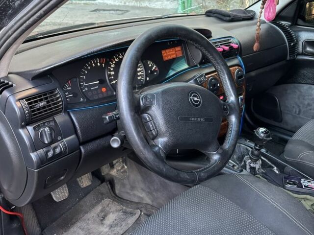 Сірий Опель Омега, об'ємом двигуна 2 л та пробігом 311 тис. км за 2500 $, фото 7 на Automoto.ua