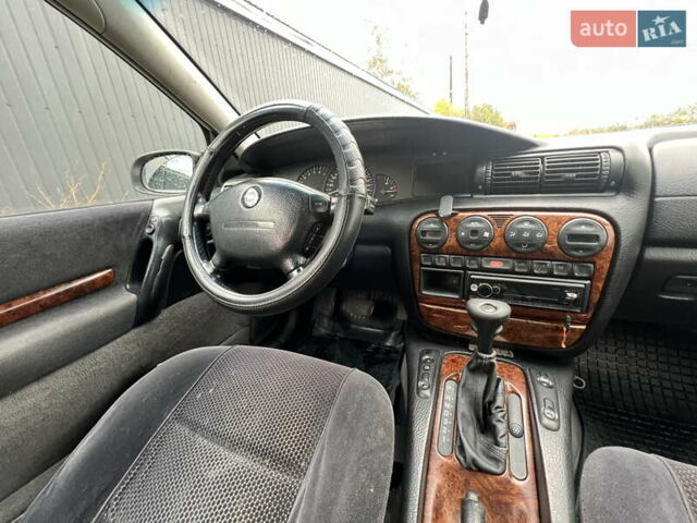 Сірий Опель Омега, об'ємом двигуна 2.5 л та пробігом 340 тис. км за 2399 $, фото 13 на Automoto.ua