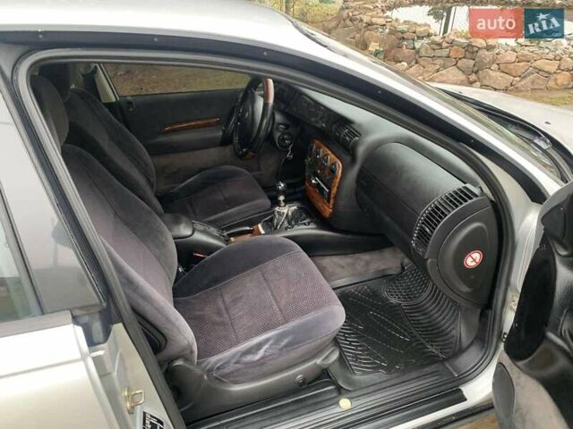 Сірий Опель Омега, об'ємом двигуна 2 л та пробігом 341 тис. км за 2300 $, фото 4 на Automoto.ua
