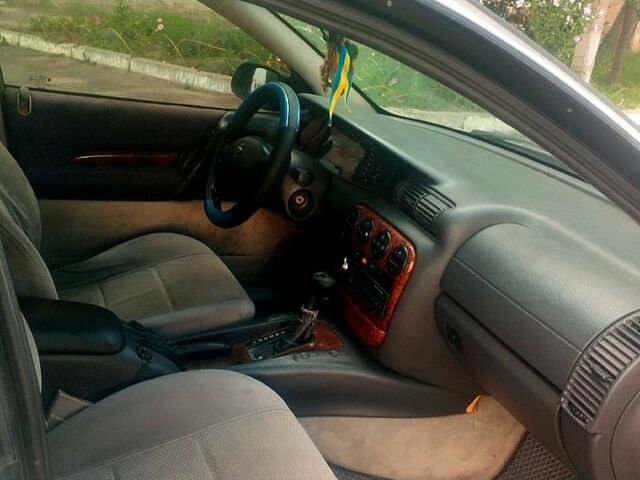 Серый Опель Омега, объемом двигателя 2 л и пробегом 368 тыс. км за 1800 $, фото 4 на Automoto.ua