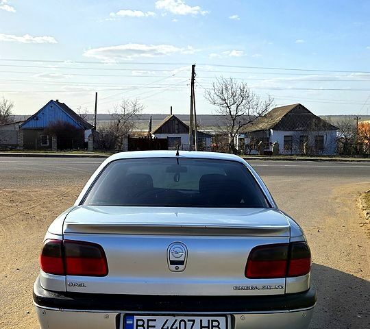 Сірий Опель Омега, об'ємом двигуна 2.5 л та пробігом 284 тис. км за 2500 $, фото 6 на Automoto.ua