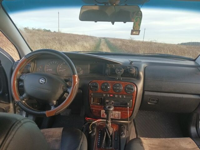 Серый Опель Омега, объемом двигателя 2 л и пробегом 400 тыс. км за 3000 $, фото 3 на Automoto.ua