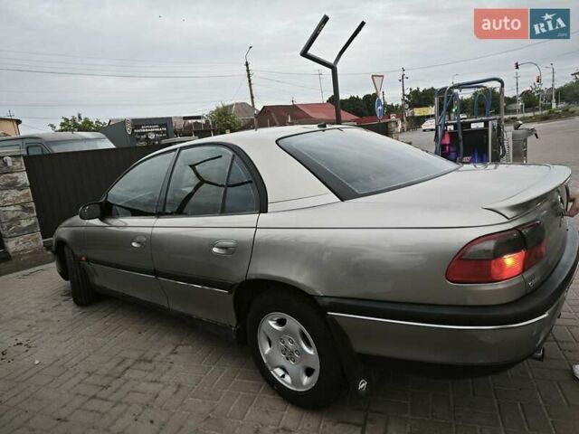 Серый Опель Омега, объемом двигателя 2.5 л и пробегом 380 тыс. км за 2700 $, фото 30 на Automoto.ua