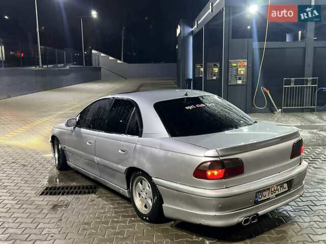 Серый Опель Омега, объемом двигателя 2.5 л и пробегом 250 тыс. км за 1550 $, фото 2 на Automoto.ua