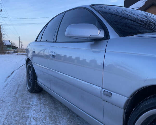 Сірий Опель Омега, об'ємом двигуна 3 л та пробігом 296 тис. км за 4000 $, фото 2 на Automoto.ua