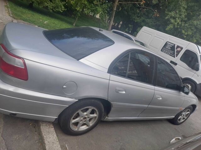 Сірий Опель Омега, об'ємом двигуна 2.2 л та пробігом 350 тис. км за 2400 $, фото 2 на Automoto.ua