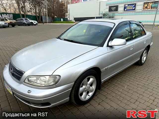 Серый Опель Омега, объемом двигателя 2.5 л и пробегом 192 тыс. км за 2800 $, фото 2 на Automoto.ua