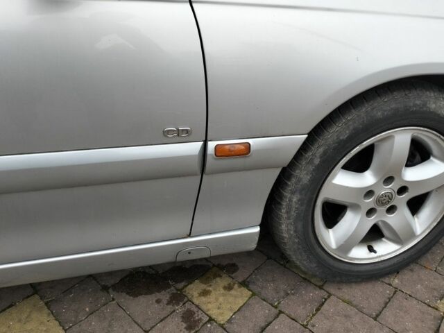 Серый Опель Омега, объемом двигателя 2.5 л и пробегом 320 тыс. км за 2400 $, фото 15 на Automoto.ua