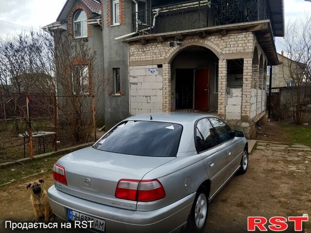 Сірий Опель Омега, об'ємом двигуна 2.5 л та пробігом 300 тис. км за 2500 $, фото 2 на Automoto.ua